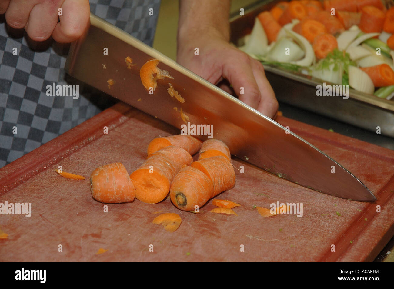 Carrots are being cut Stock Photo