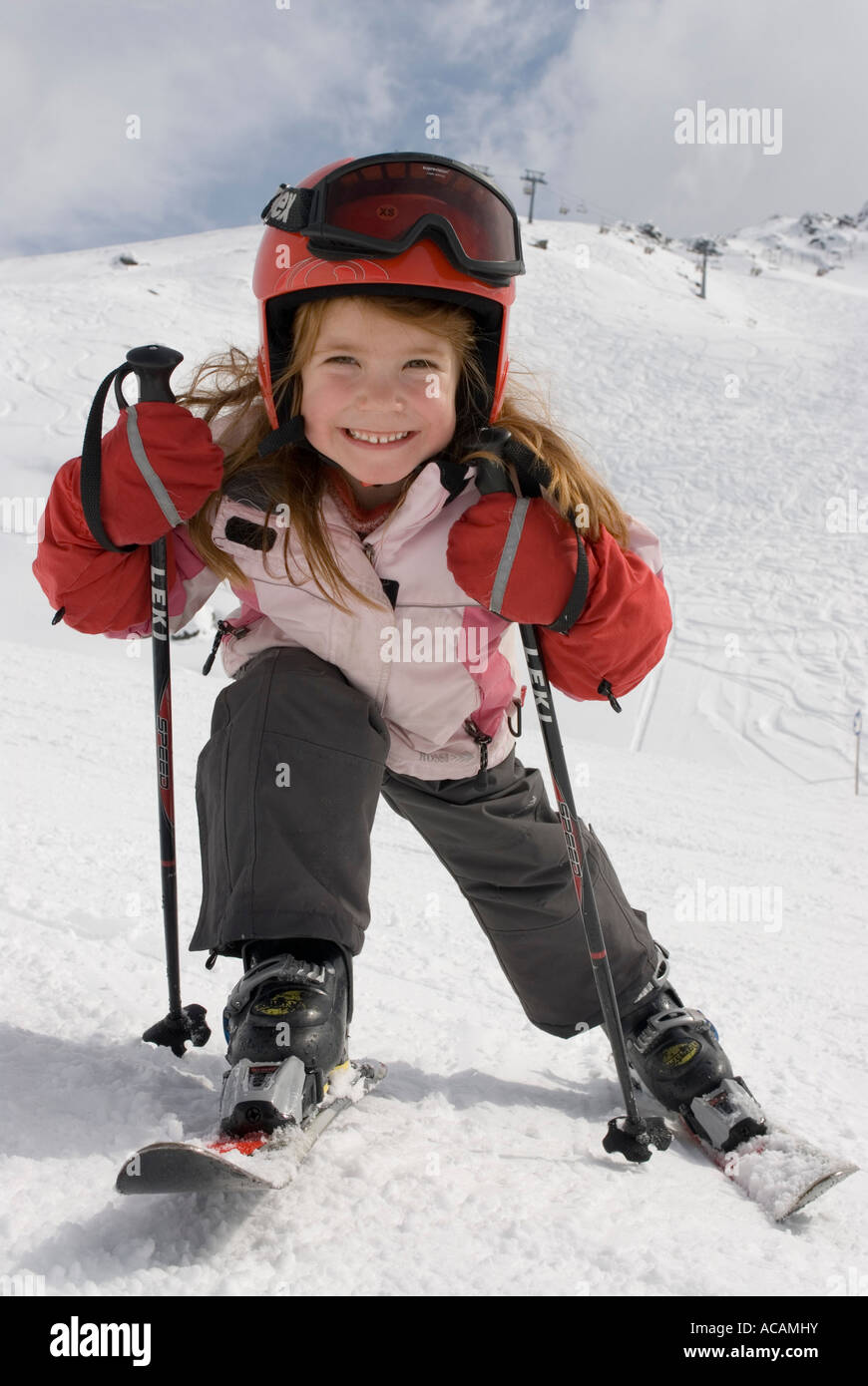 Girl with helmet skiing Stock Photo Alamy