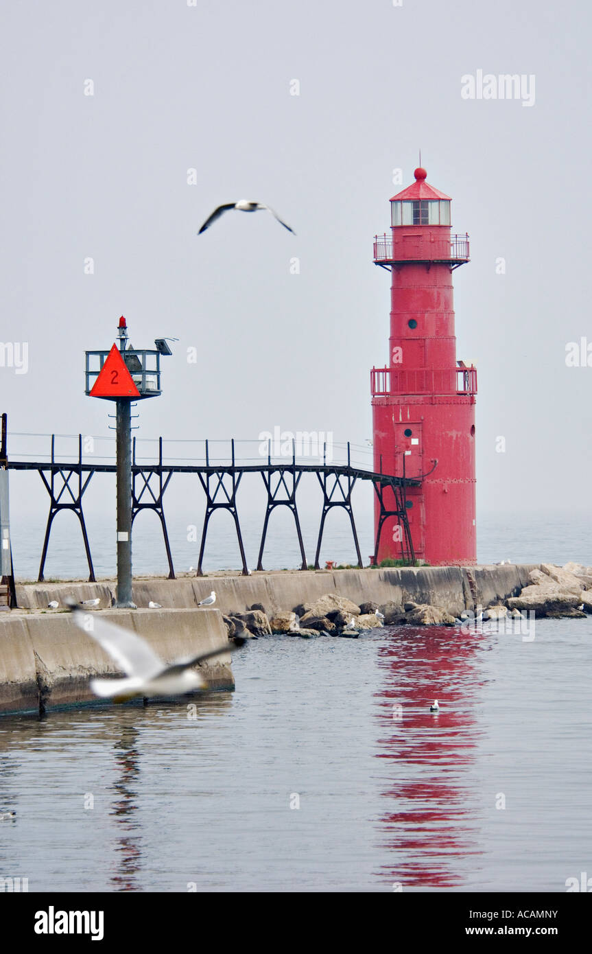 Algoma Lighthouse and Seagulls with Fog Over Lake Michigan Algoma Stock Photo