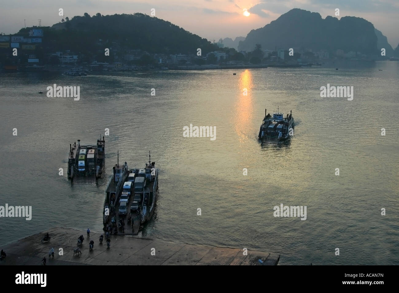 Evening ferryboats from Halong City to Hon Gai district, Halong City, Vietnam Stock Photo