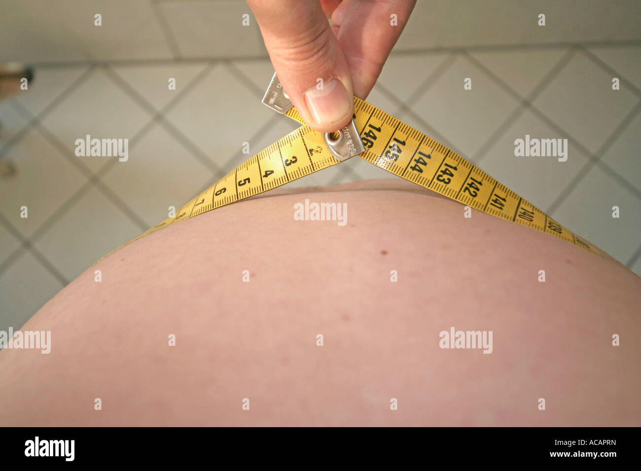Measuring the abdominal girth Stock Photo Alamy