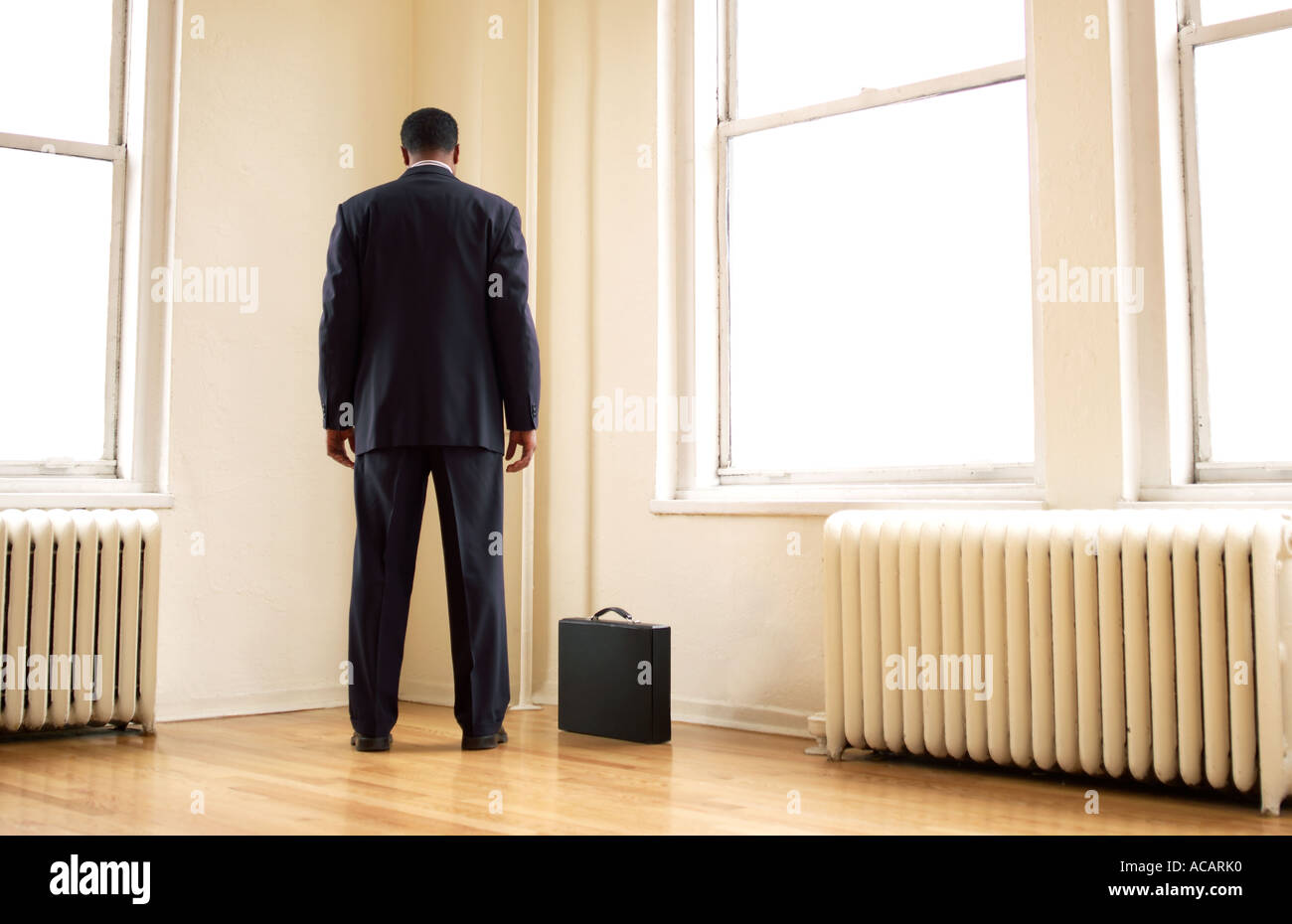 Man facing away suit hi-res stock photography and images - Alamy