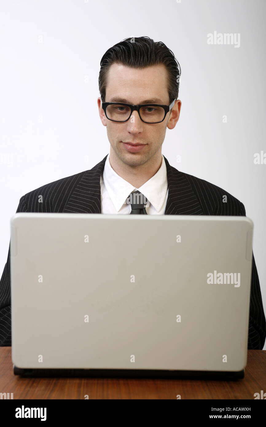 Young Businessman works with notebook Stock Photo