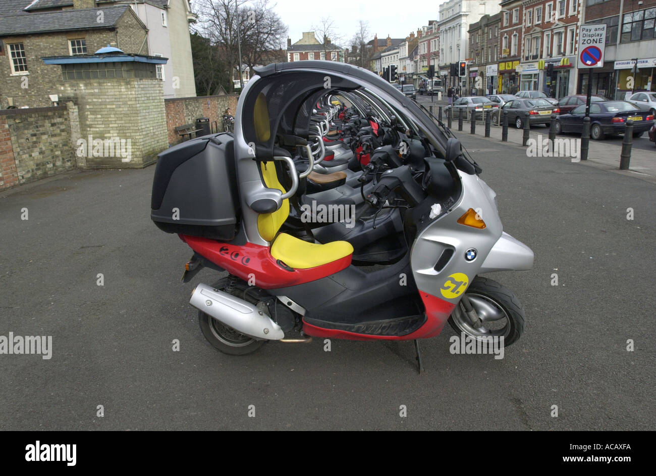 A rally of BMW C1 s in support of not wearing helmets whilst riding this unusual bike UK Stock Photo