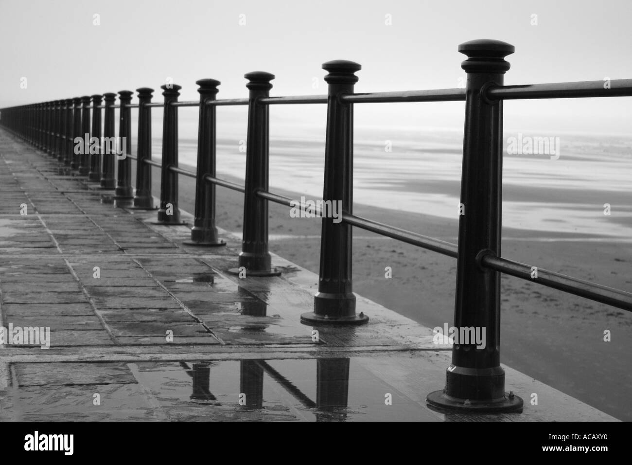Beach promenade railing seafront Black and White Stock Photos & Images ...