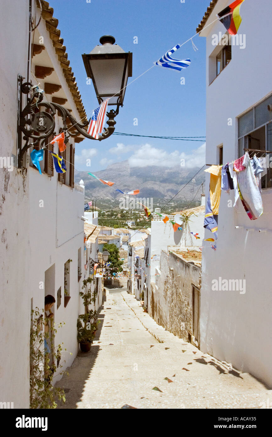 Traditional white washed houses in narrow street Old Town Altea near Alicante Spain Stock Photo