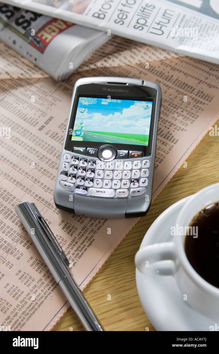 a blackberry mobile phone on desk Stock Photo
