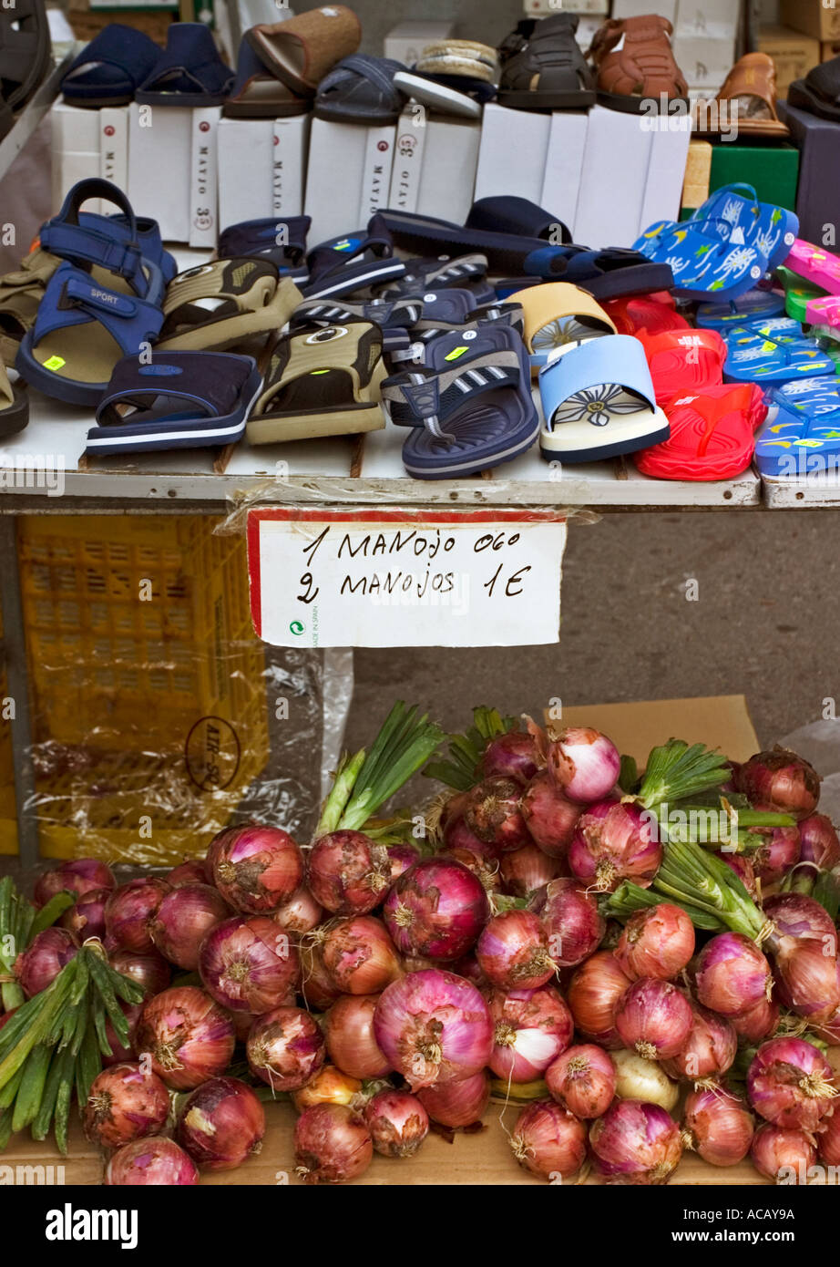 Onions and Shoes for sale on same stall Santa Pola Market near Alicante  Spain Stock Photo - Alamy