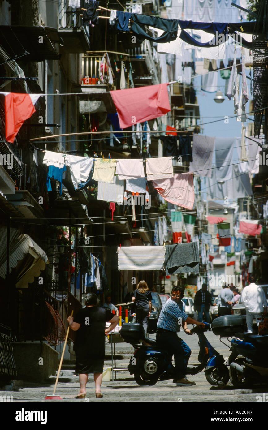 Naples Italy Washing flags adorn the streets of the old fishermans quarter of Pallonetto Stock Photo