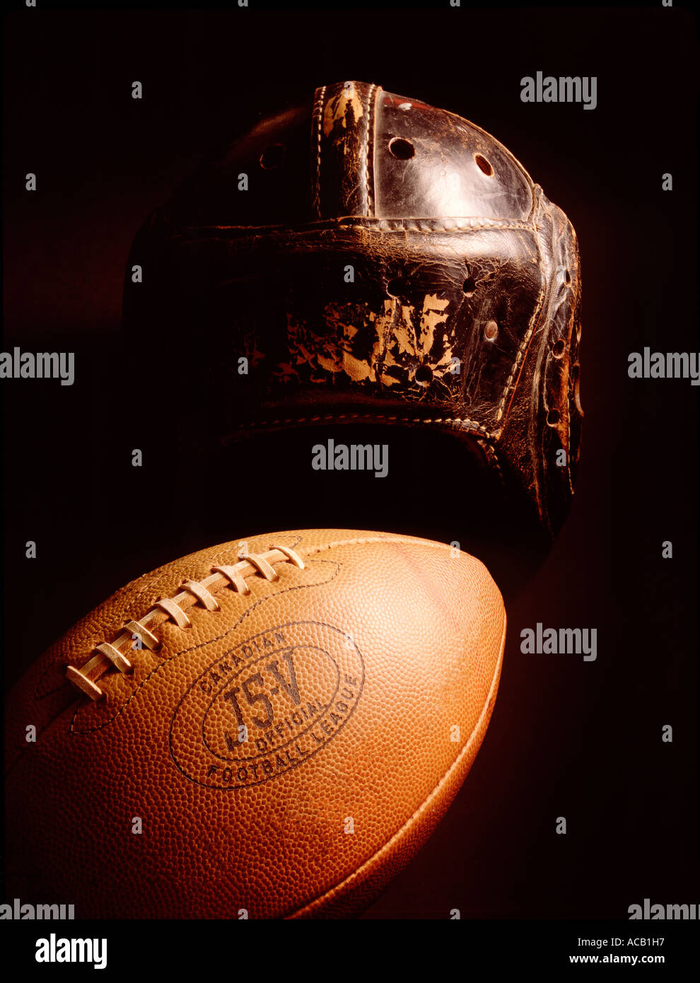 Canadian football and helmet Stock Photo Alamy