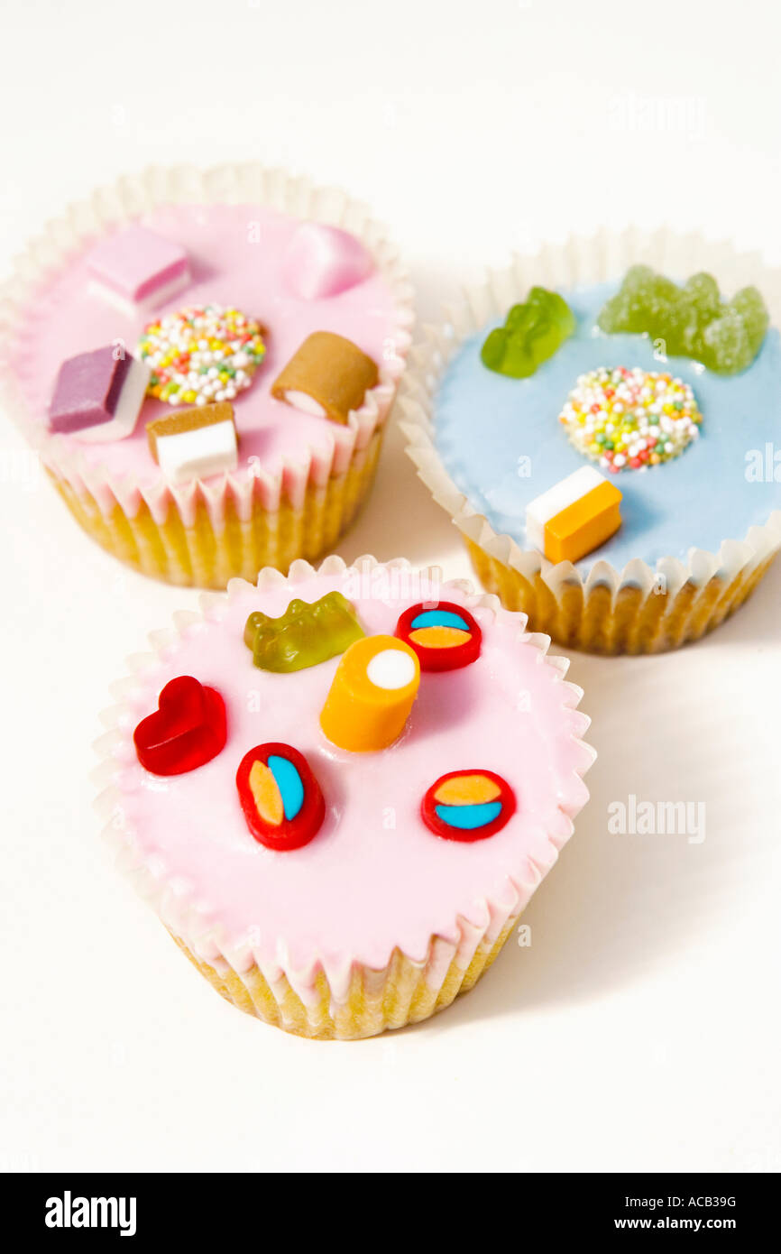 Fairy cakes decorated with sweets Stock Photo