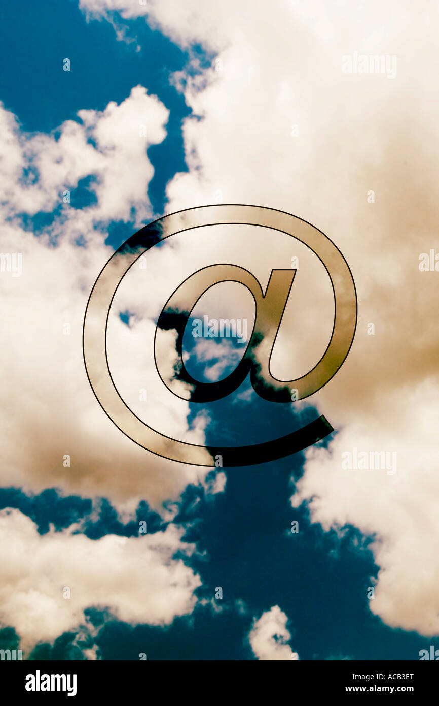 Internet @ symbol against sky backdrop Stock Photo