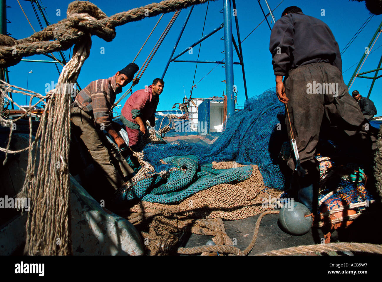 Loading fishing nets hi-res stock photography and images - Alamy