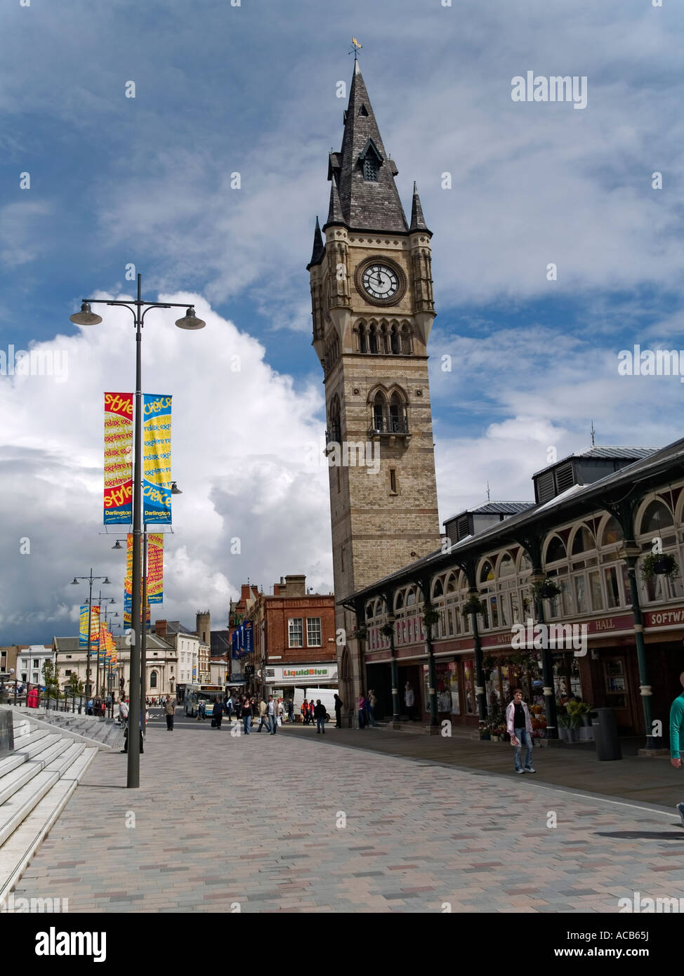 West Row pedestrianised street covered market and tower clock ...