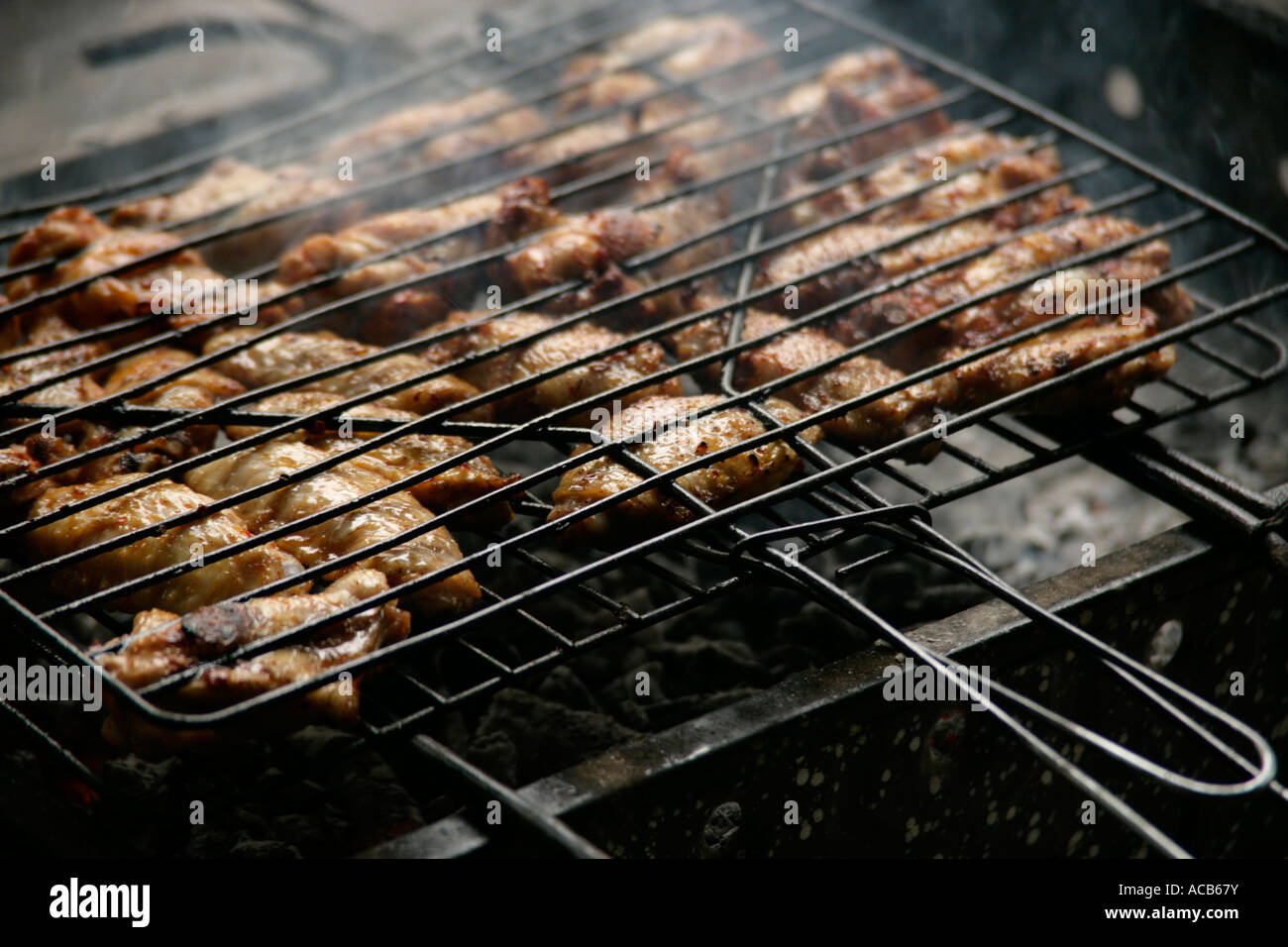 Chicken drumsticks on the barbecue Stock Photo Alamy
