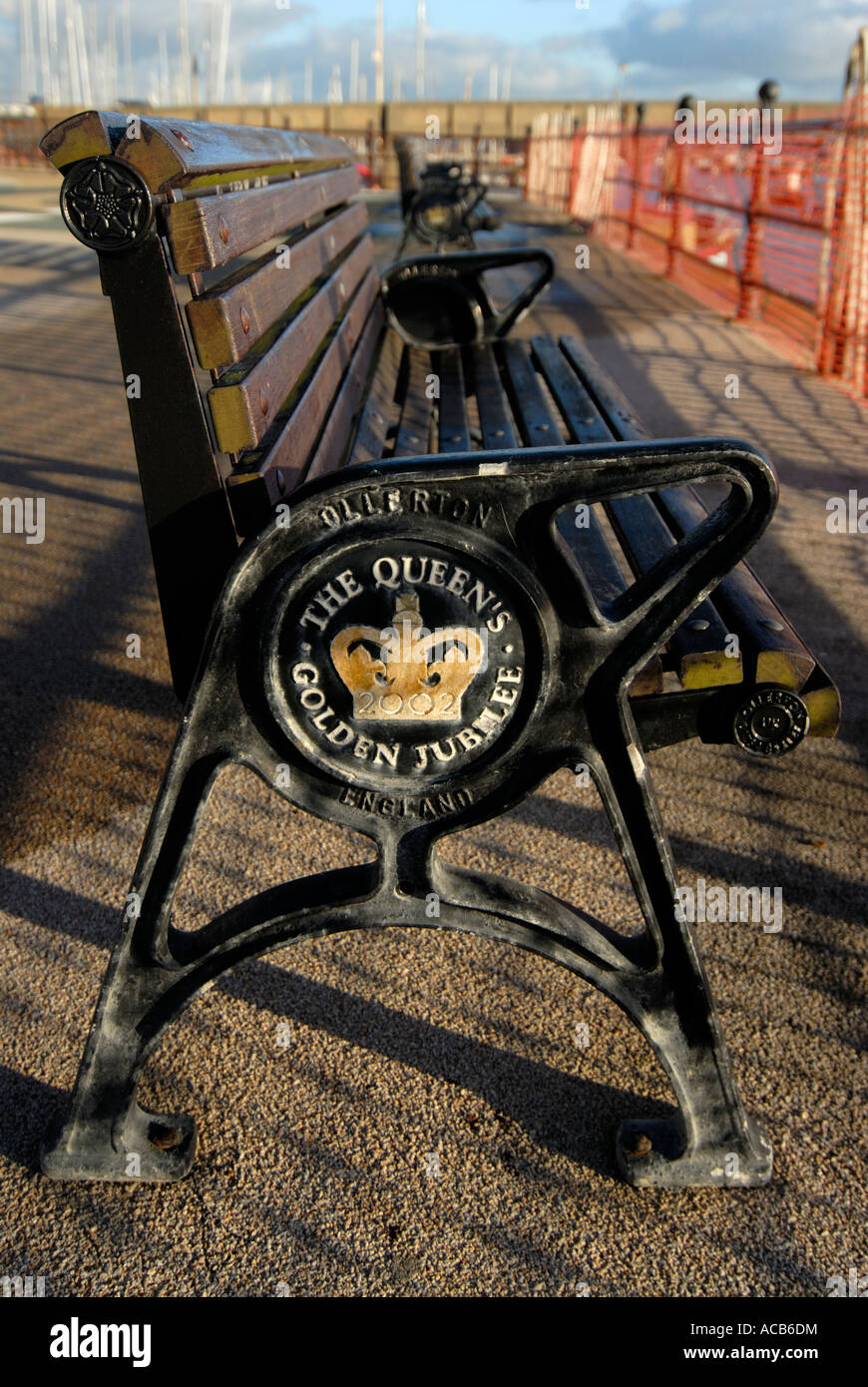 Bench with plaque commemorating The Queen's Golden Jubilee at Shoreham by Sea West Sussex UK Stock Photo