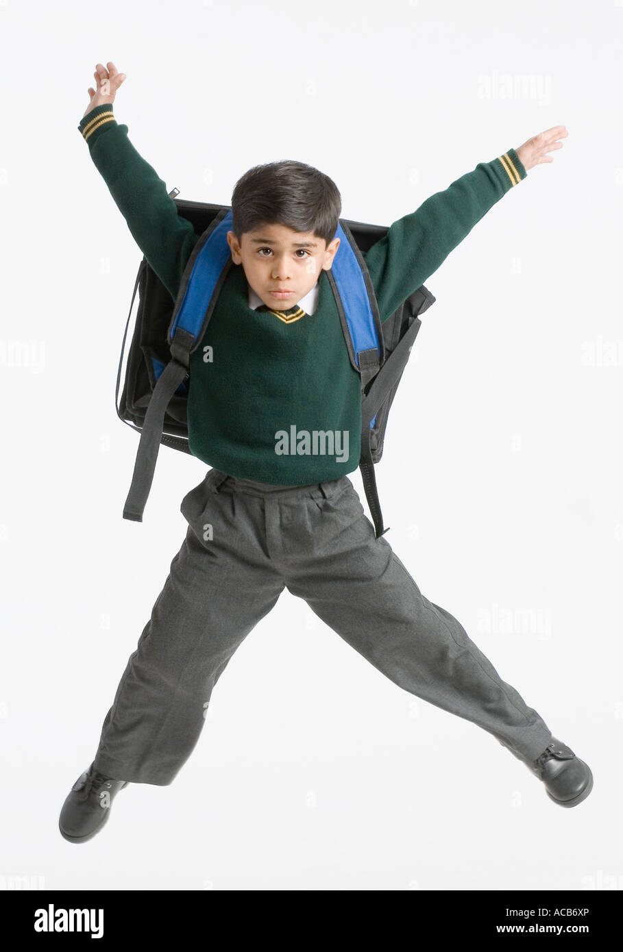 Portrait of a schoolboy jumping Stock Photo