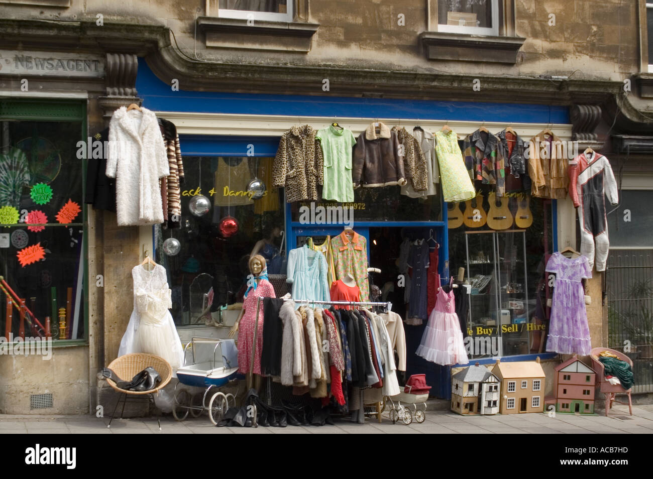 Shop selling antique clothes and bric a brac on Walcot Street BATH England UK Stock Photo