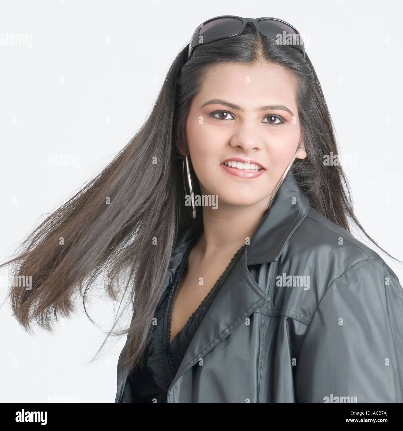 Portrait of a teenage girl smiling Stock Photo - Alamy
