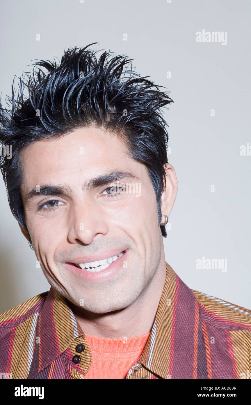 Portrait of a young man smiling Stock Photo - Alamy
