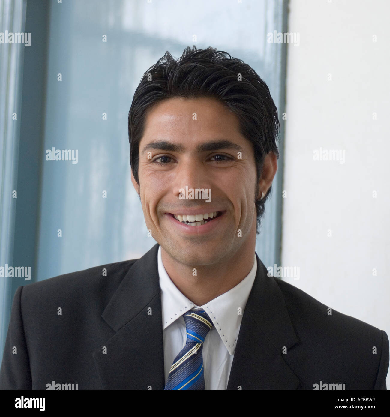 Portrait of a businessman smiling Stock Photo - Alamy