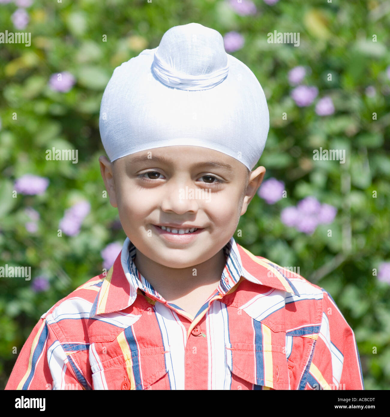 Portrait of a boy smiling Stock Photo - Alamy