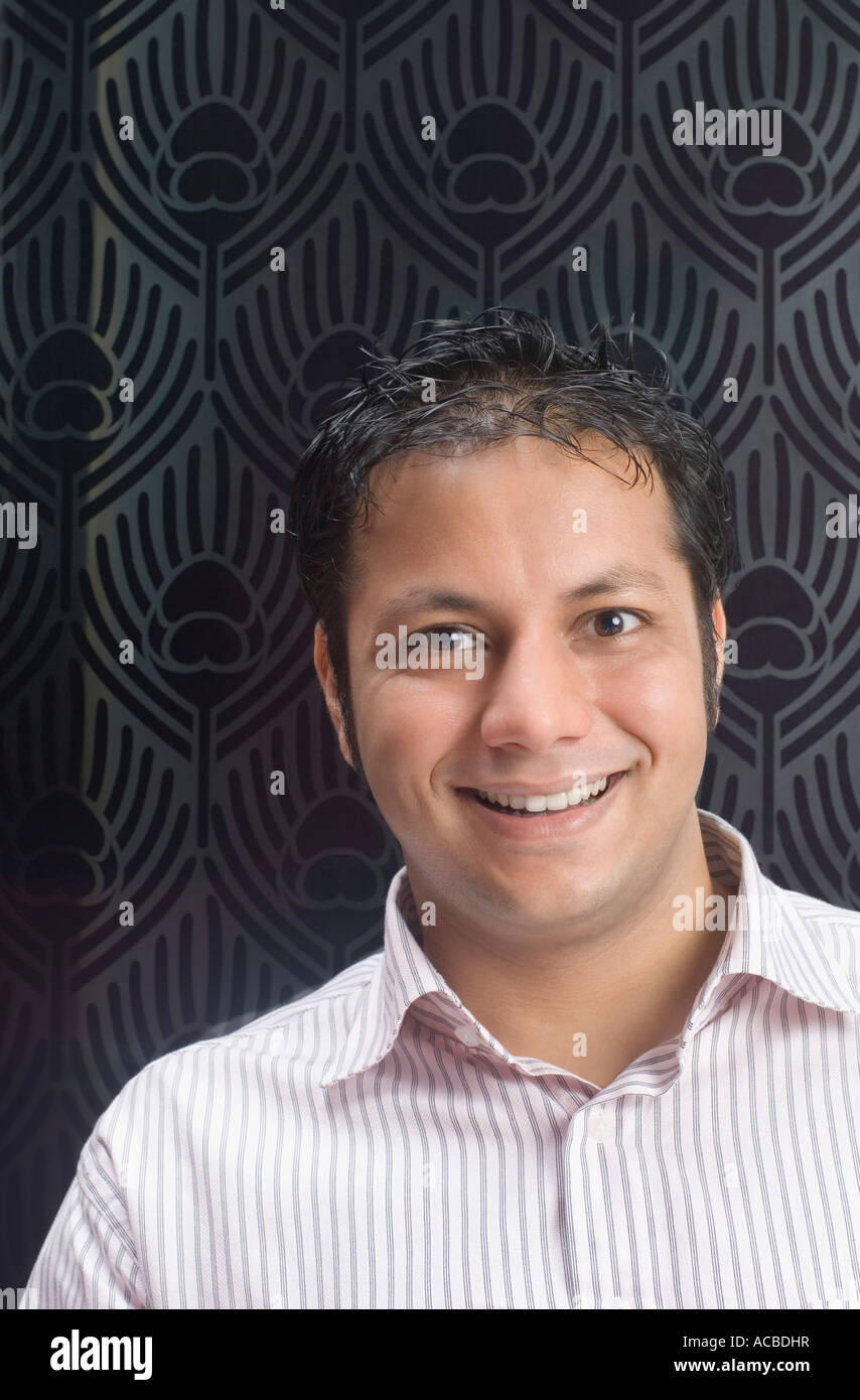 Portrait of a mid adult man smiling Stock Photo - Alamy