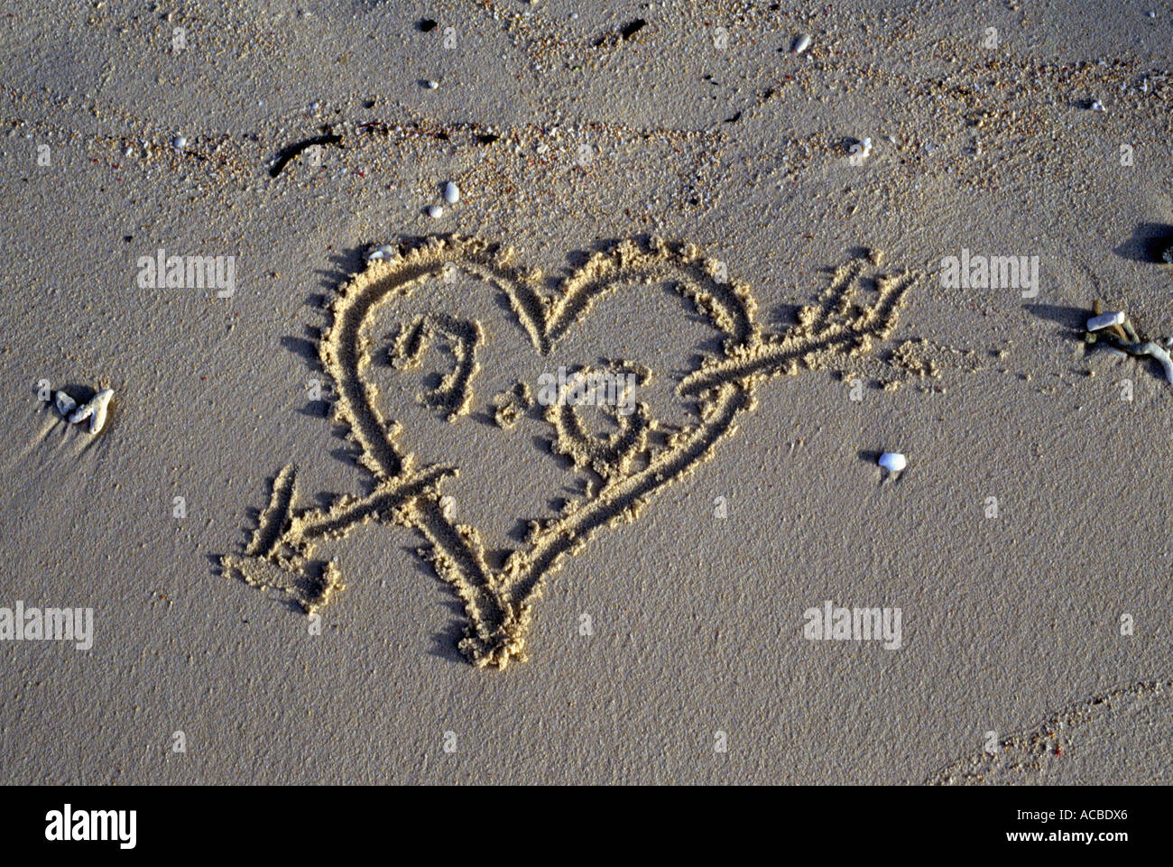 holiday love affair marked at beach Stock Photo