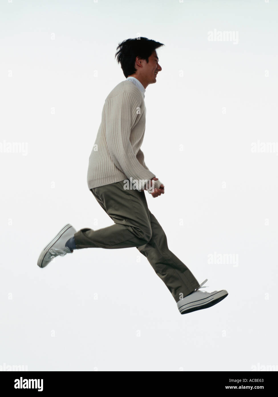 Energetic People Jumping Casual Stock Photo - Alamy
