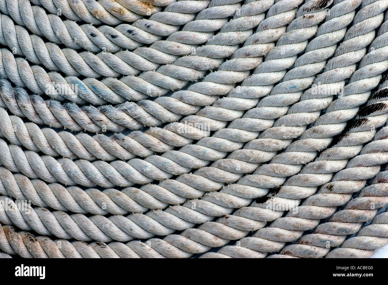 coil of rope at docklands Stock Photo