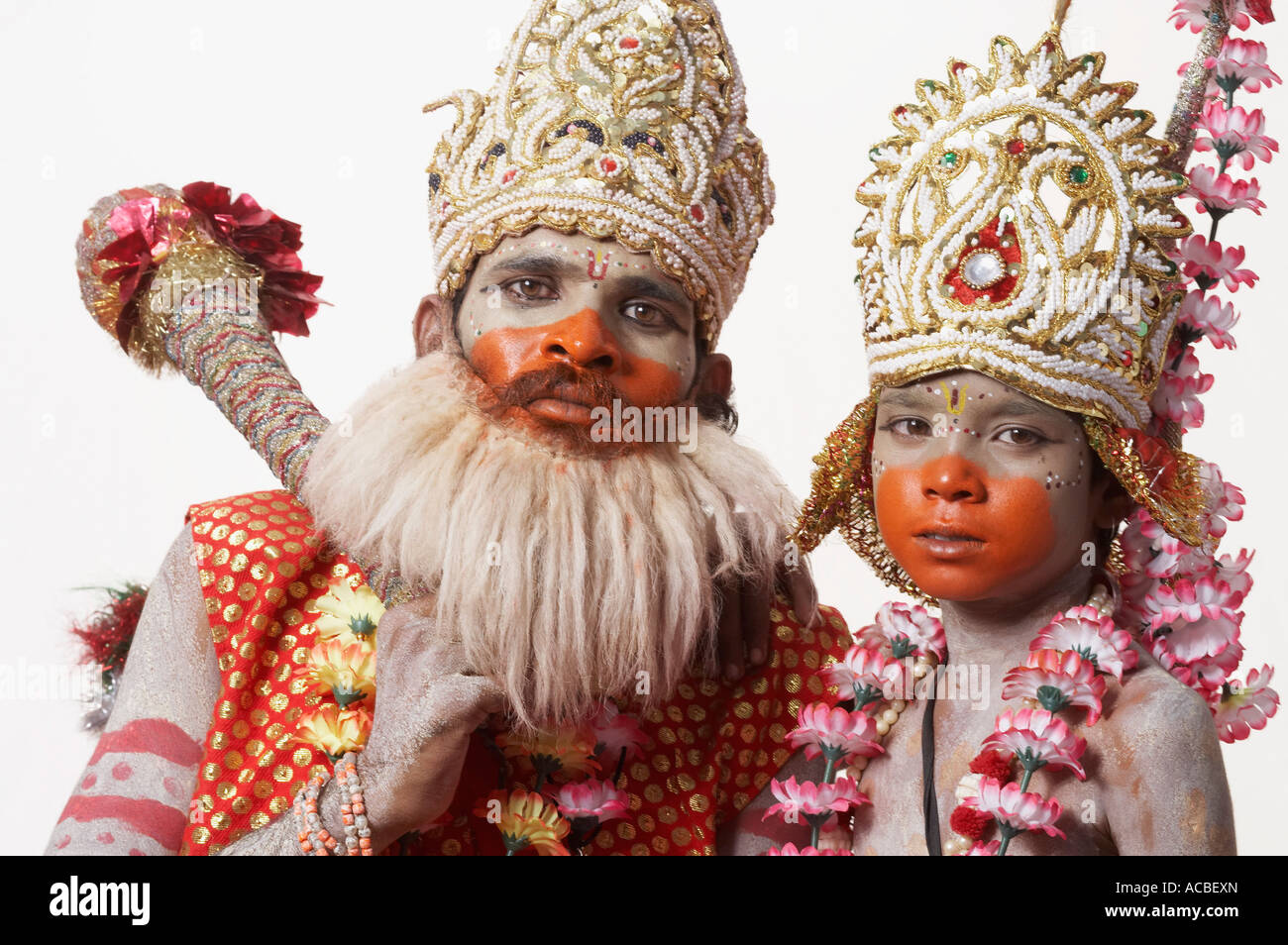 Portrait of a young man and a boy in a traditional clothing Stock Photo ...