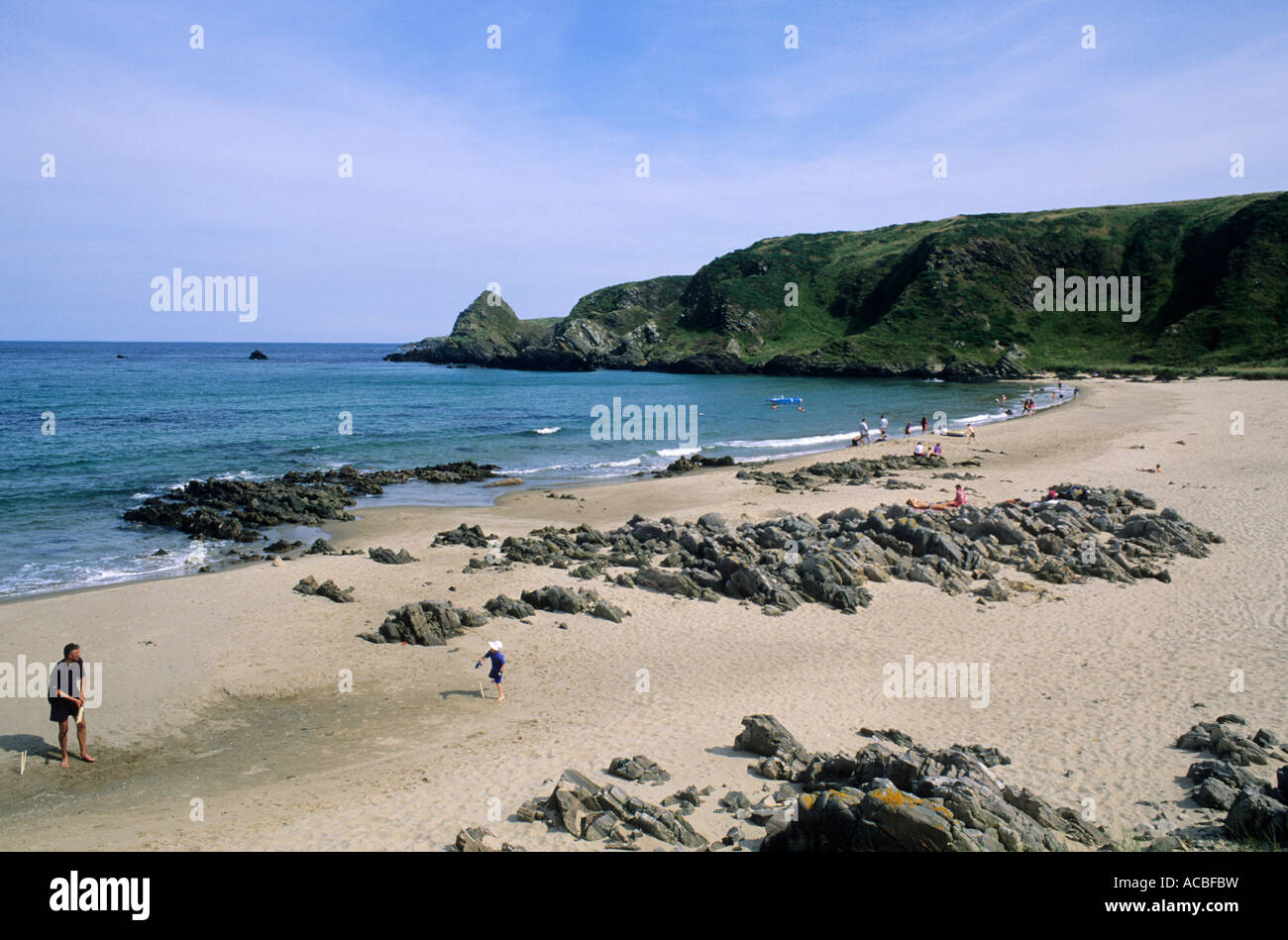 Sunnyside Beach, near Cullen, cricket, father and son playing, Moray Firth, coast, coastline, sand, sandy, beach, Scotland, UK, Stock Photo
