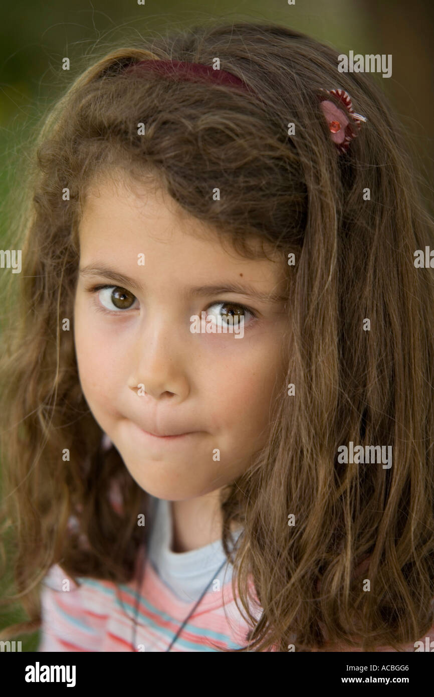 Expressive little girl face close up Stock Photo - Alamy