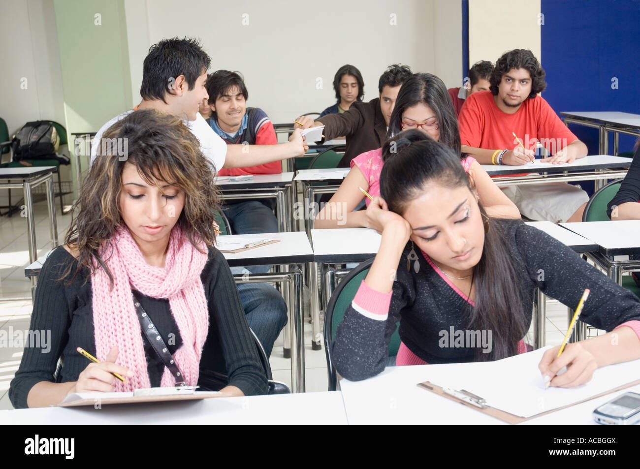 Group of college students giving an exam in a classroom Stock Photo Alamy