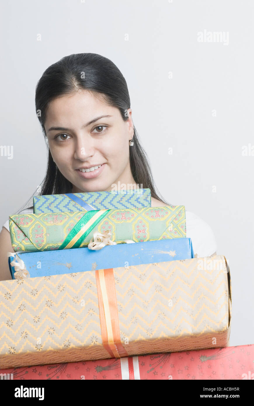 Young happy woman presents hi-res stock photography and images - Alamy