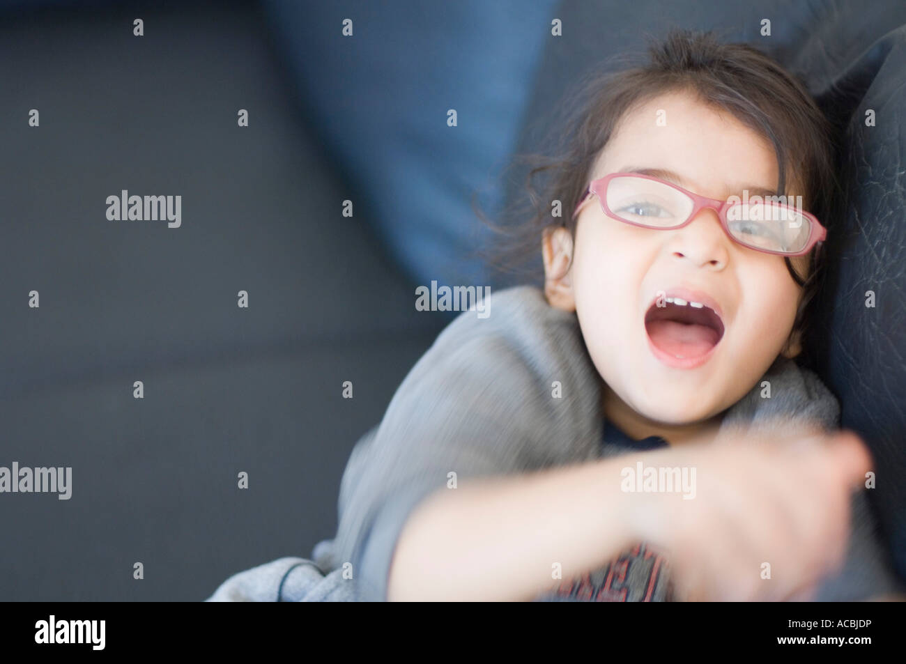 Portrait of a girl laughing Stock Photo - Alamy