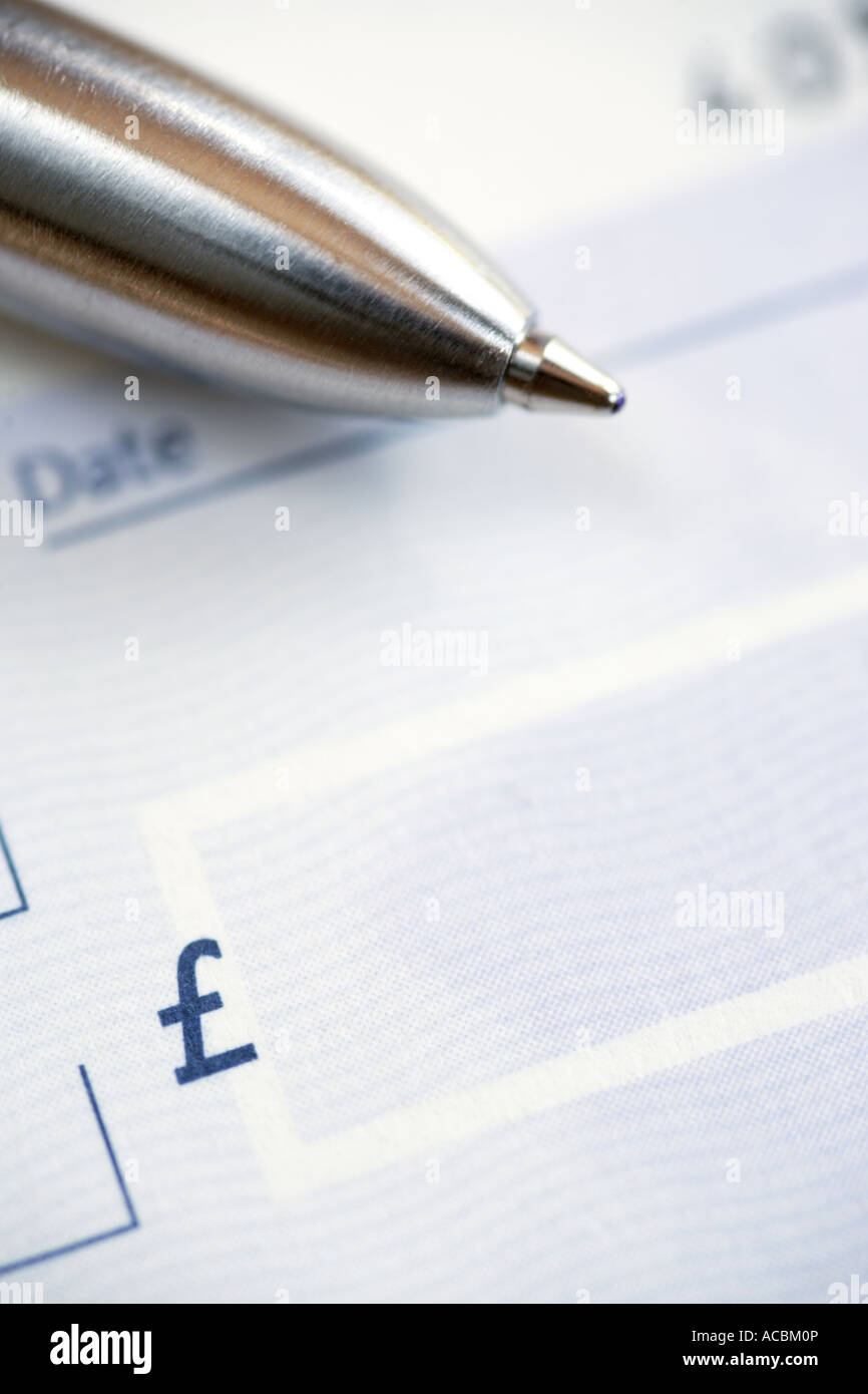 Pen on Cheque Book Stock Photo Alamy