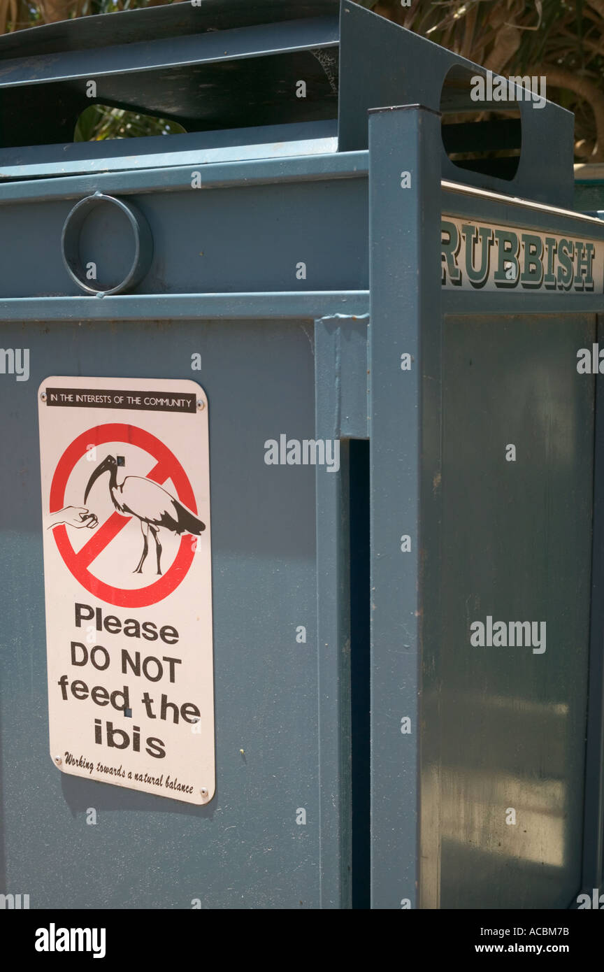 A rubbish bin with warning sign on the Gold Coast, Australia Stock