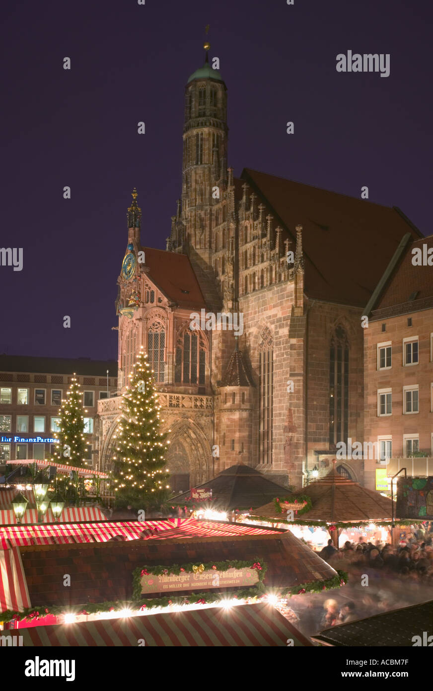 The Christmas Market in Hauptmarkt, Nuremberg with The Frauenkirche behind. Stock Photo