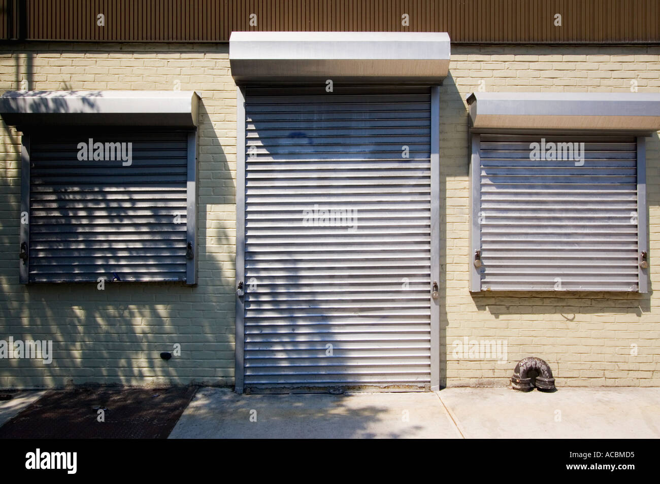 store-front-with-metal-gates-ACBMD5.jpg