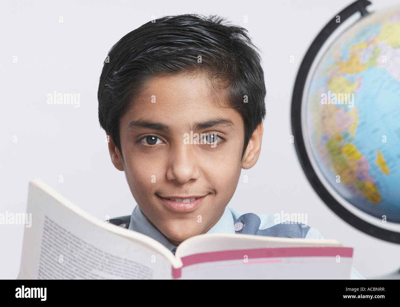 Portrait of a schoolboy studying Stock Photo - Alamy
