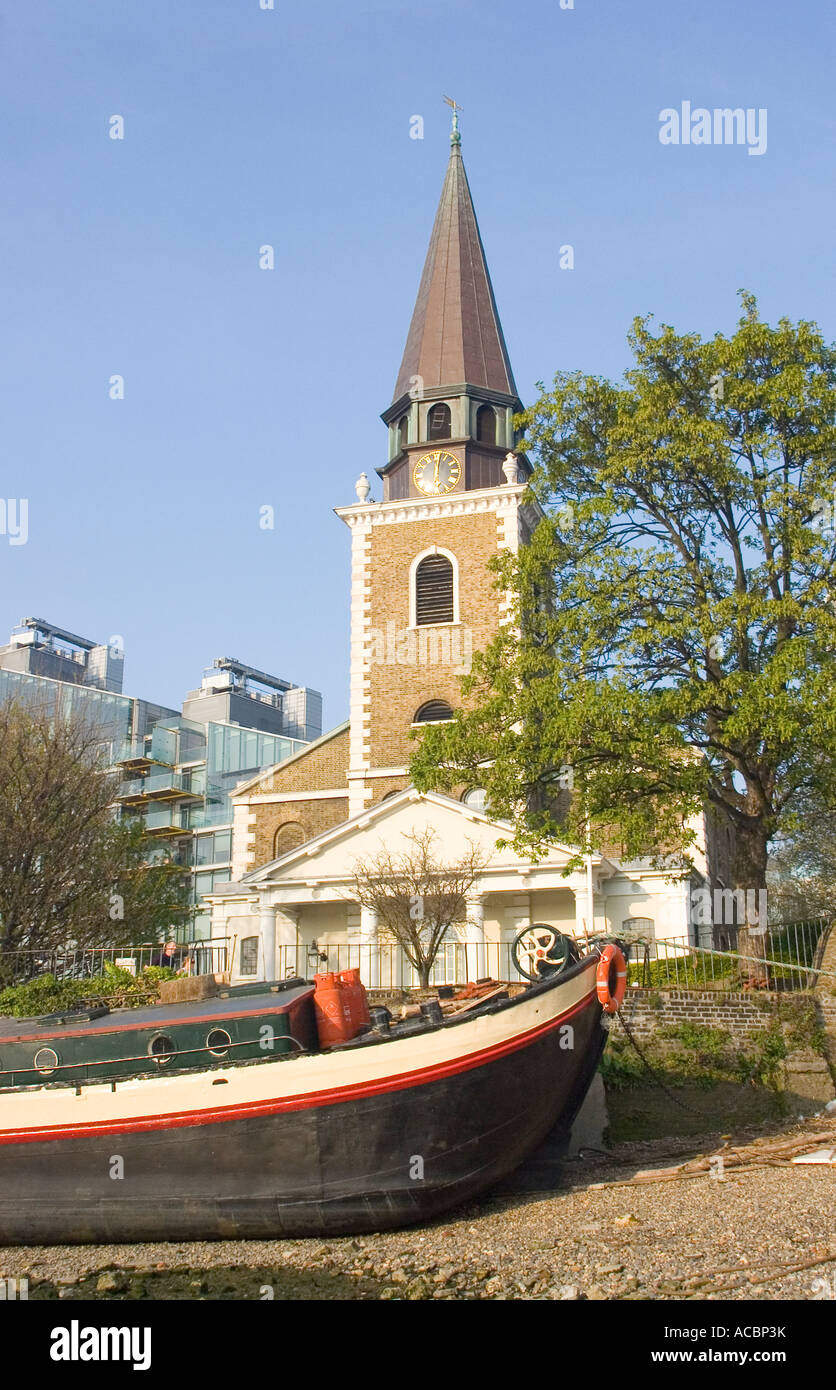 St Mary's Church Battersea from the river with houseboat barges Stock