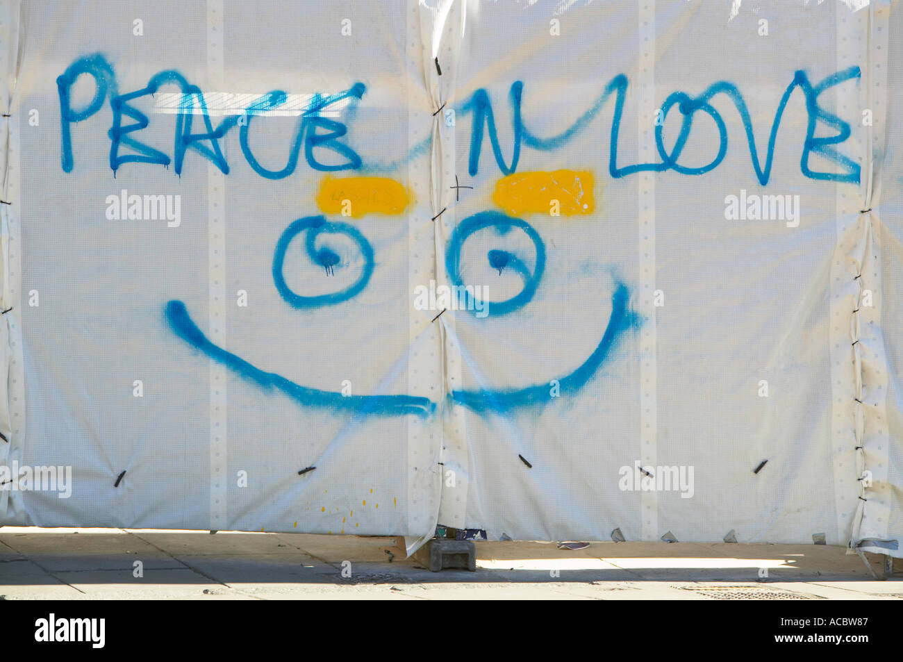 Peace n love graffiti with smiling face Stock Photo