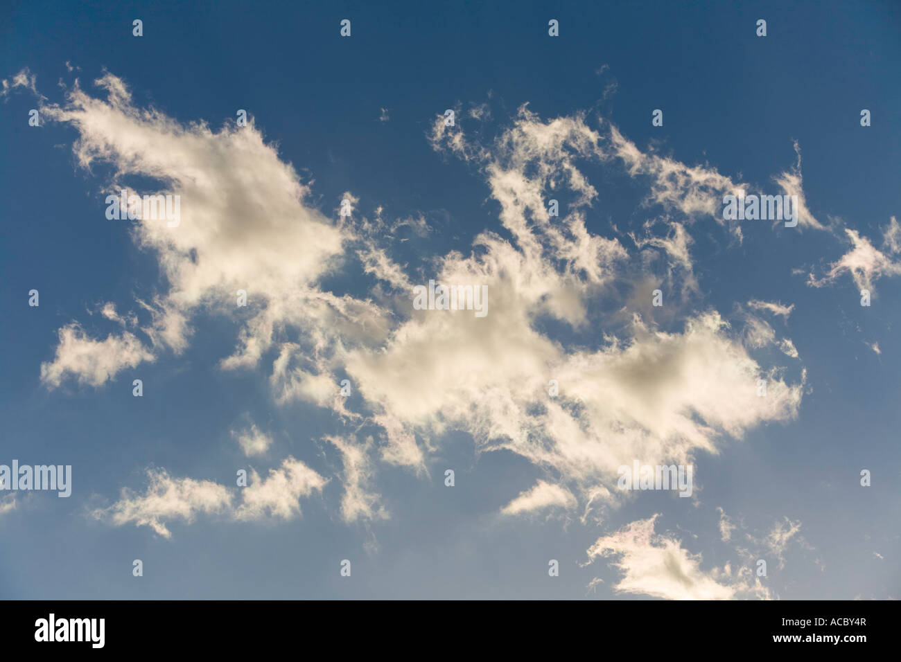 Cloudy blue sky Stock Photo - Alamy