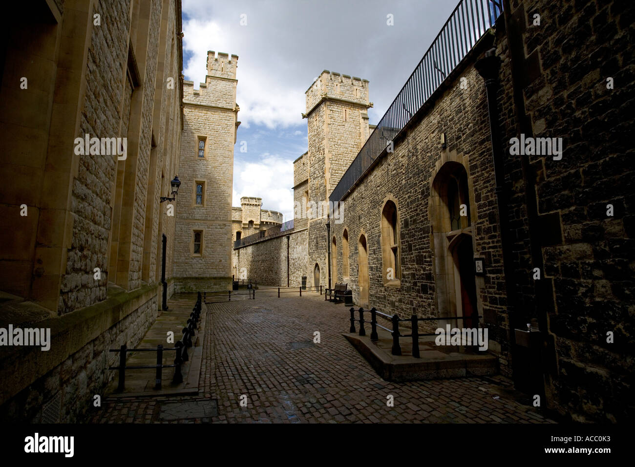 Cobblestone walkways and fortifications at London's historic prison the Tower of London. UK Sights and Attractions. Stock Photo