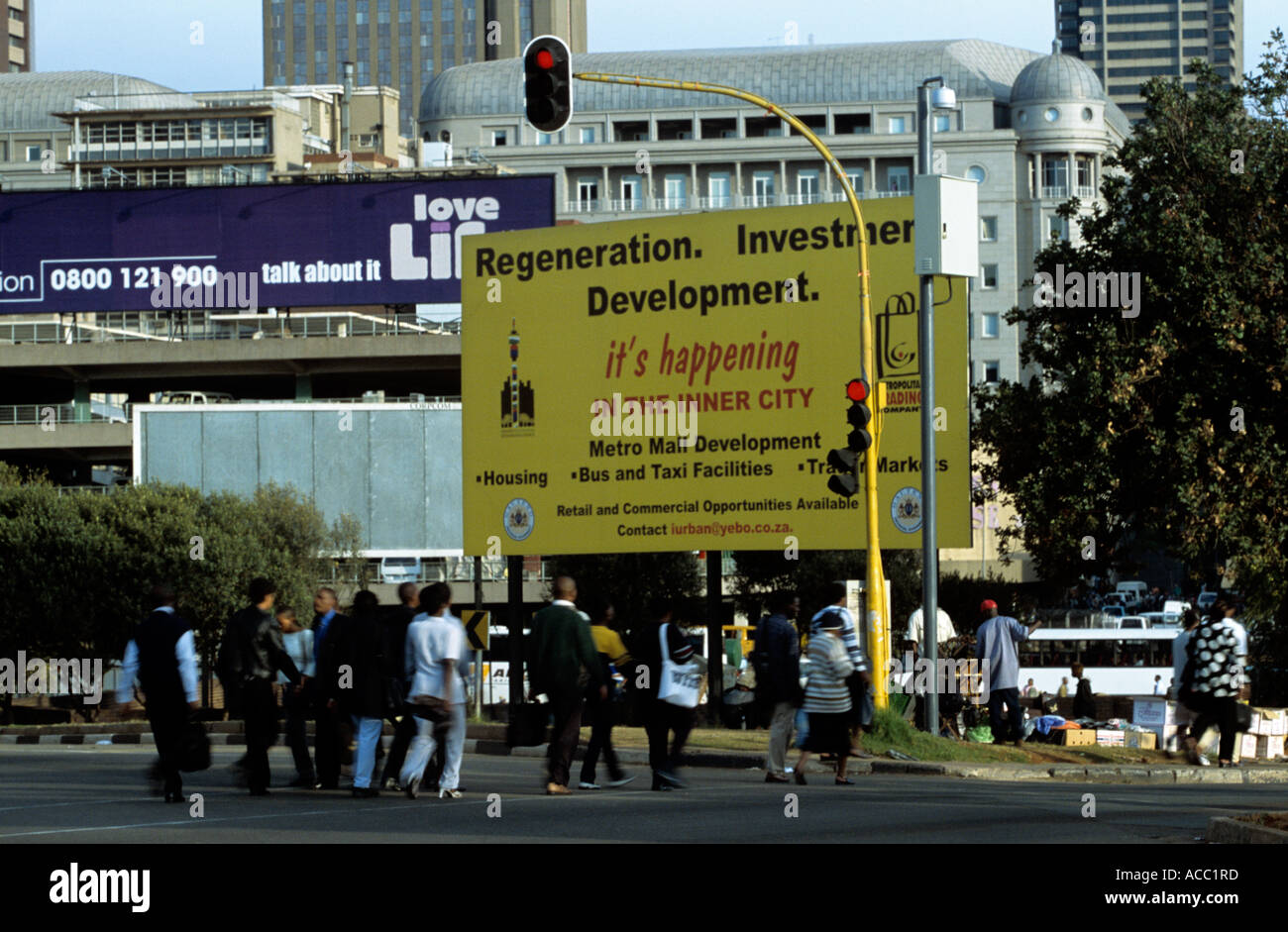 Pedestrians crossing at traffic light junction, Johannesburg, South Africa Stock Photo