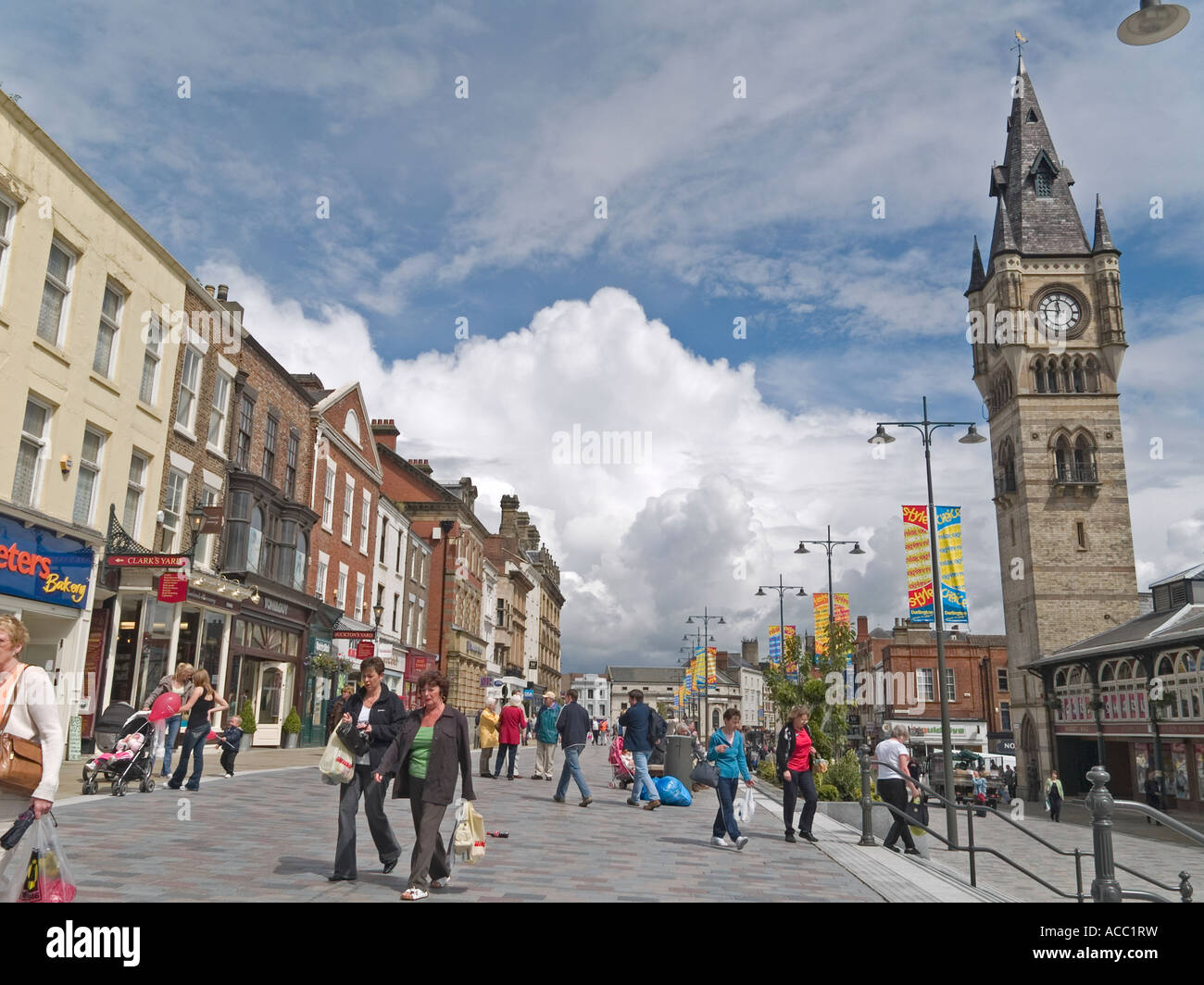 High Row main shopping street with covered market tower clock Darlington Co Durham UK Stock Photo