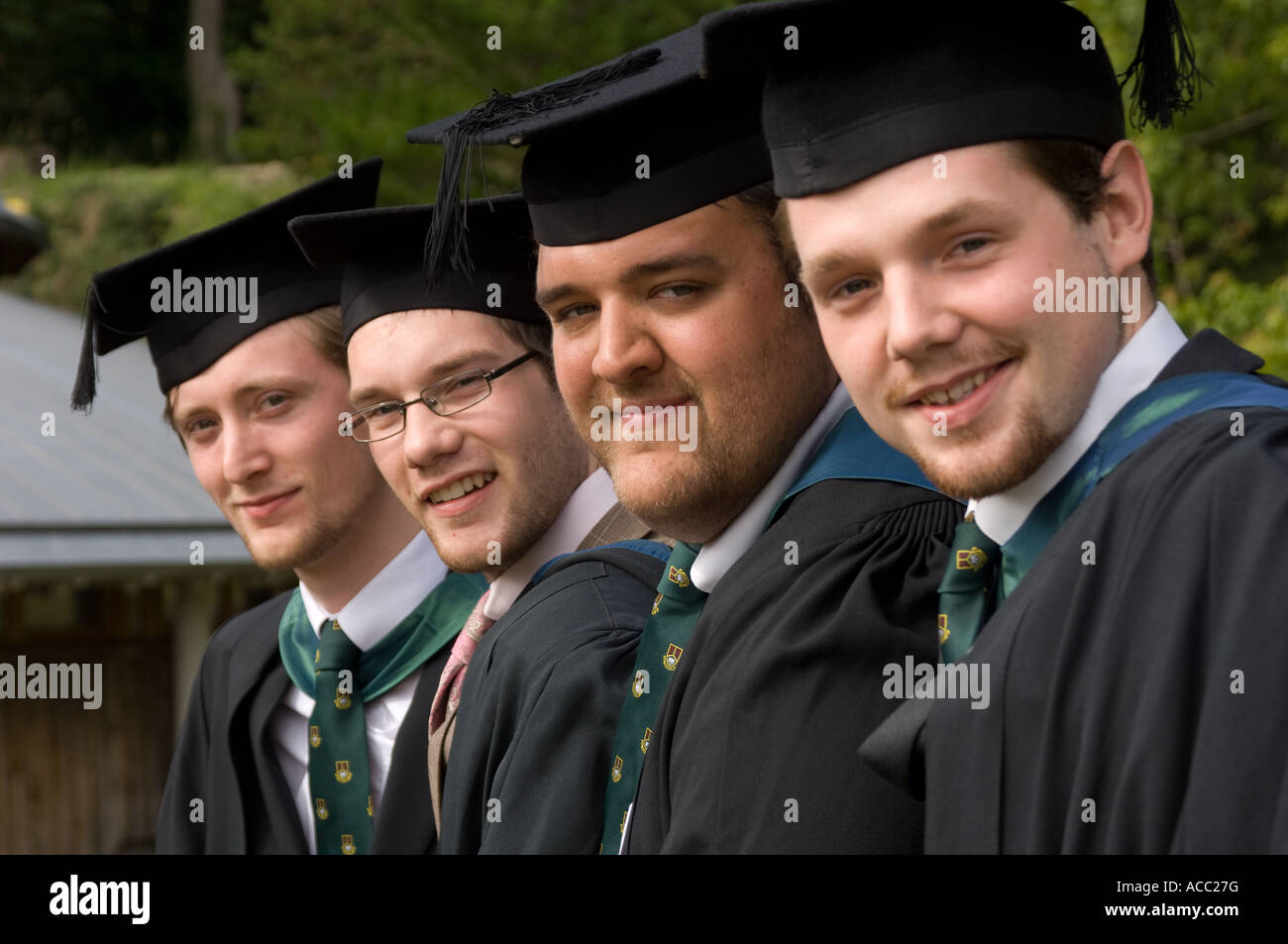 Boy wearing graduation cap gown hi-res stock photography and images - Alamy