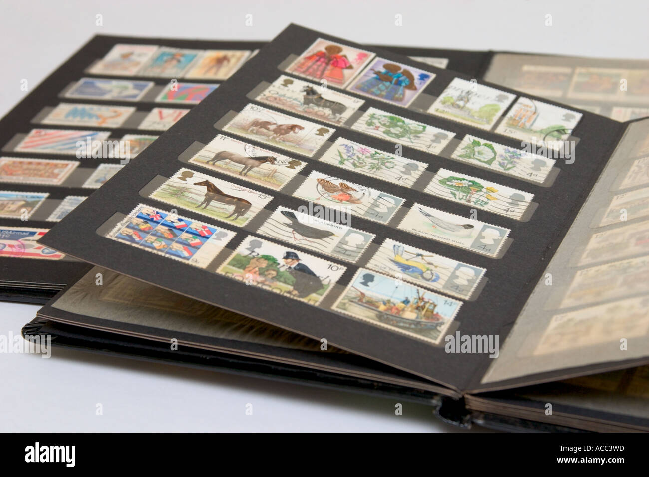 stamp album collection Stock Photo - Alamy