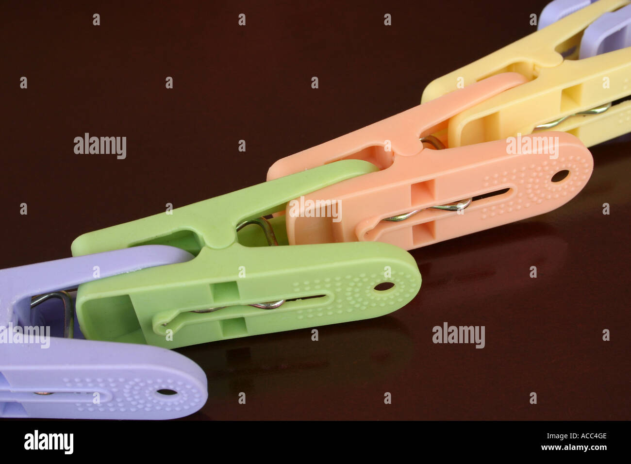 cloth pegs forming a chain Stock Photo
